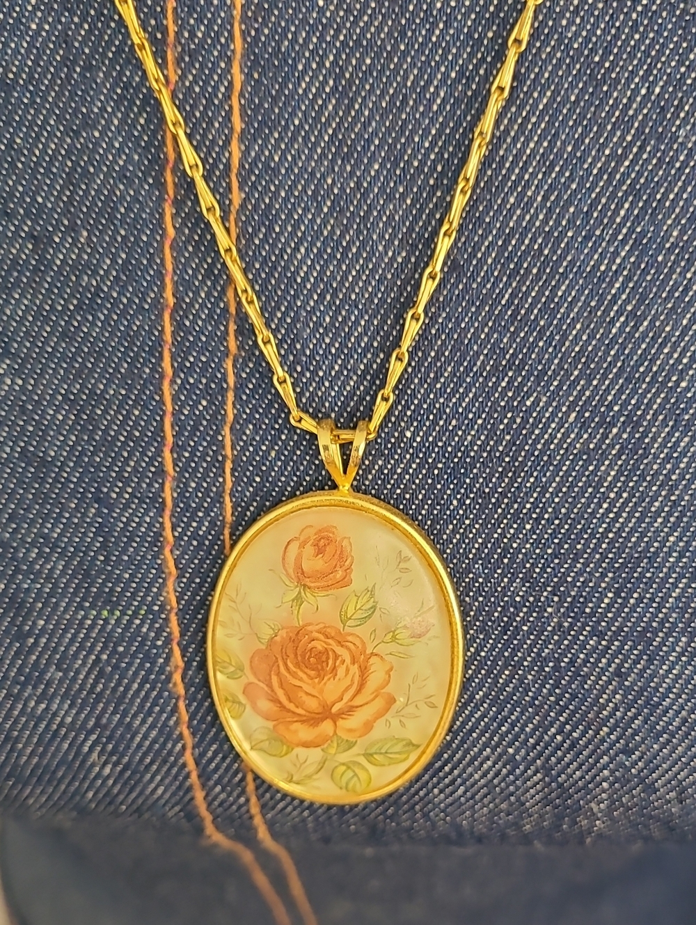 Gold Oval Pendant Necklace with Pink Rose Motif